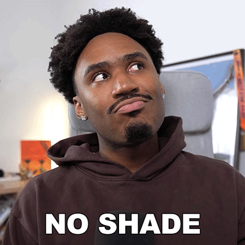 Man in Brown Hoodie Saying No Shade
