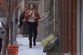 Man in Brown Jacket Running