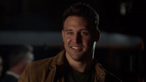 Man in Brown Jacket Smiling