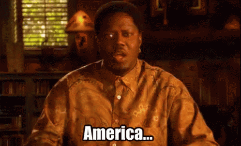 Man in Brown Shirt Says America
