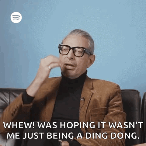 Man in Brown Suit Talking