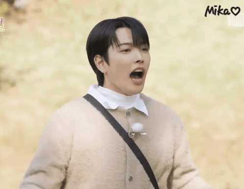 Man In Brown Sweater White Shirt Hands Up GIF