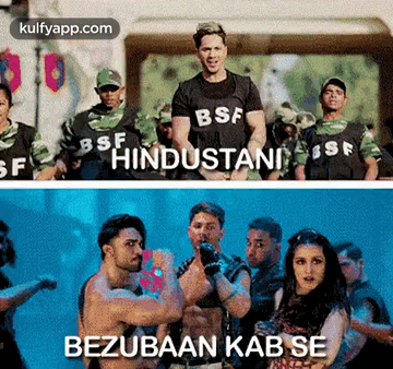 Man in BSF Shirt Next to Soldiers
