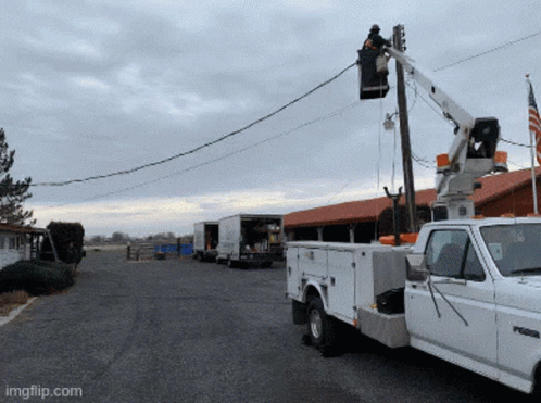 Man in Bucket Working on Power Line