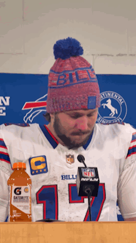 Man in Buffalo Bills Jersey at Podium