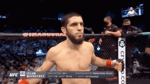Man In Cage With Islam On Chest GIF