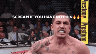 Man In Cage With Sign Scream If You Have No Chin GIF