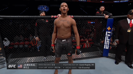 Man in Cage with UFC Sign