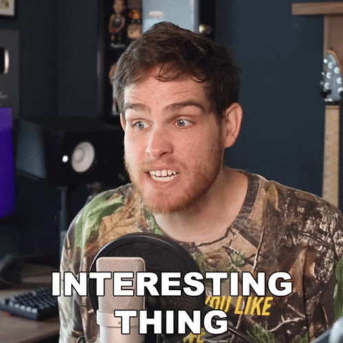 Man in Camo Shirt Talking Into Microphone Interesting Thing