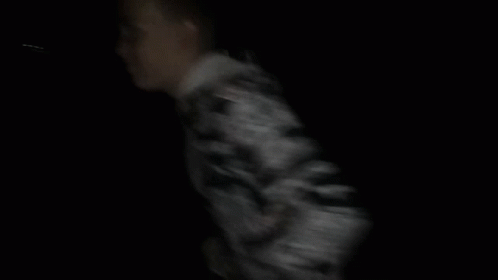 Man in Camouflage Jacket Dark