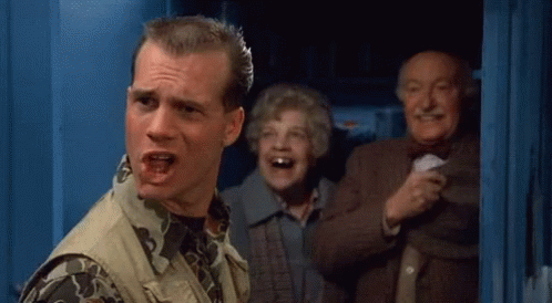 Man In Camouflage Vest And Two Older People GIF