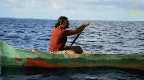 Man In Canoe With National Geographic Logo GIF