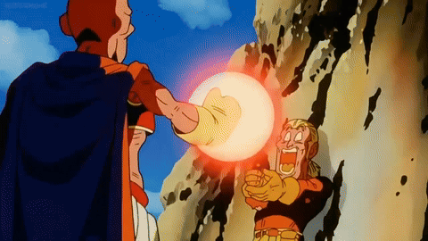 Man in Cape Holding Glowing Ball