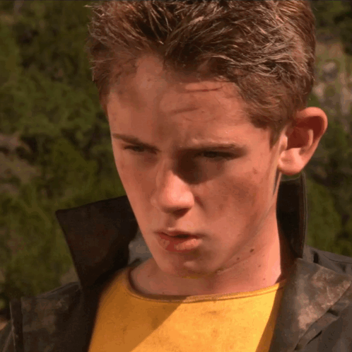 Man In Cape In Front Of Batman Logo GIF