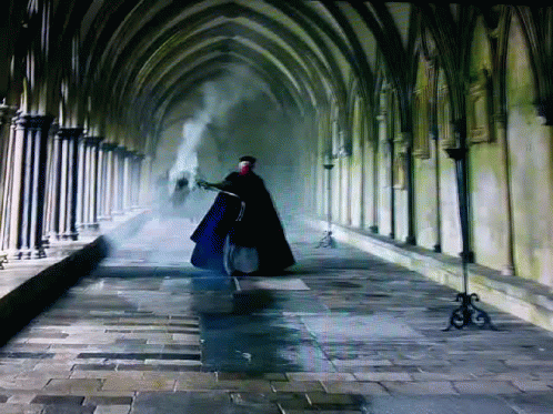 Man in Cape Walking