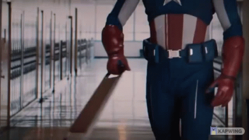 Man In Captain America Costume Holding Sword GIF