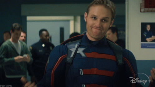 Man in Captain America Costume in Hallway with Disney+ Logo