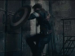 Man in Captain America Uniform Holding Shield