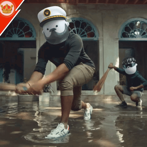 Man in Captain's Hat Kneeling in Water