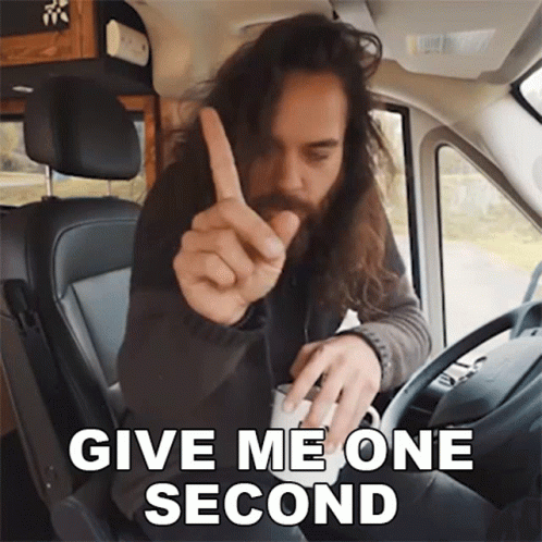Man in Car Giving Middle Finger