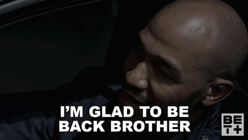 Man in Car Saying Glad to Be Back