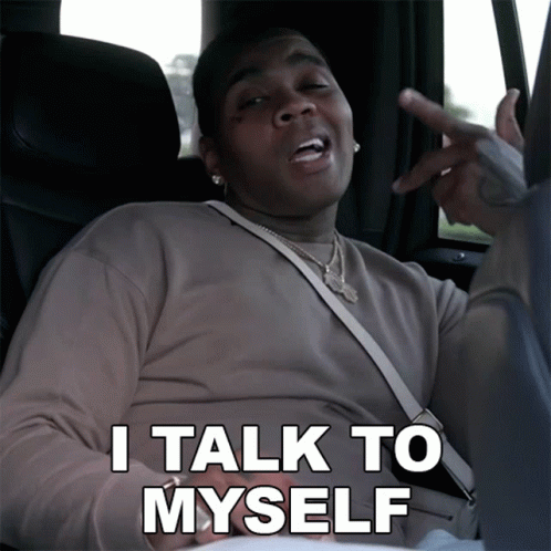 Man in Car Saying I Talk To Myself