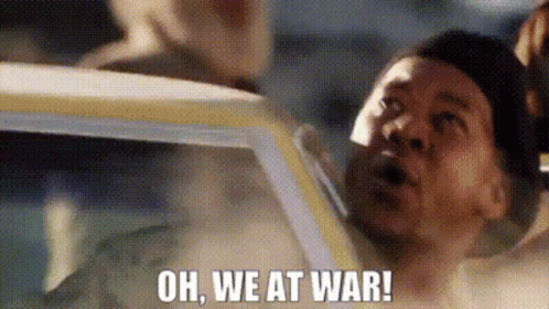 Man in Car Saying Oh We At War