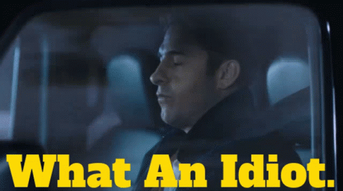 Man in Car Saying What an Idiot