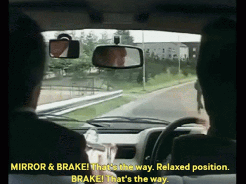 Man in Car Says Mirror and Brake Relaxed Position