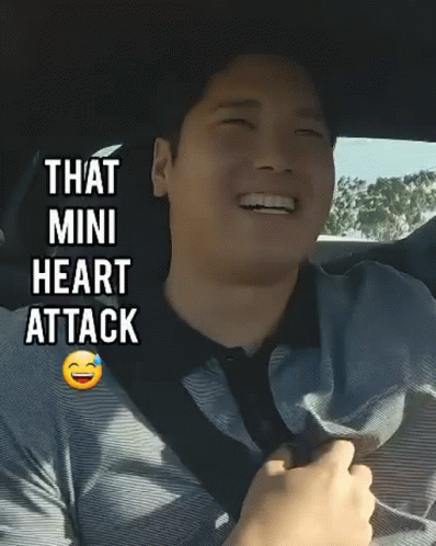 Man in Car Smiling Saying Mini Heart Attack