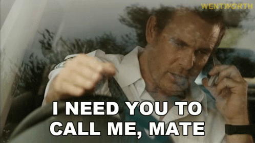 Man in Car Talking on Cell Phone Saying I Need You to Call Me Mate