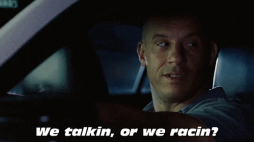 Man in Car We Talkin or We Racin