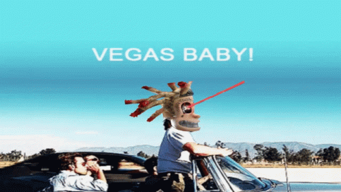 Man in Car with Mask Saying Vegas Baby