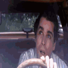 Man In Car With Mouth Open GIF