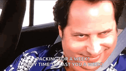 Man in Car With Packing for Sexy Week