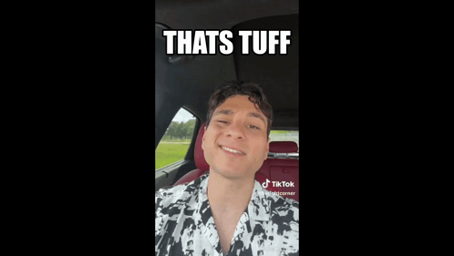 Man in Car With Tuff Words