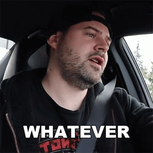 Man in Car With Whatever