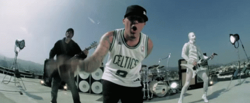 Man In Celtics Jersey Playing Guitar GIF