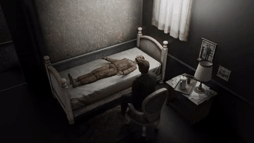 Man in Chair Facing Bed With Man Portrait