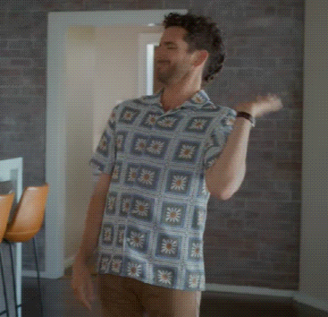 Man in Checkered Shirt Dancing