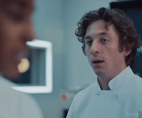 Man in Chef Coat Talking
