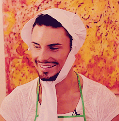 Man in Chef Hat and Apron Smiling