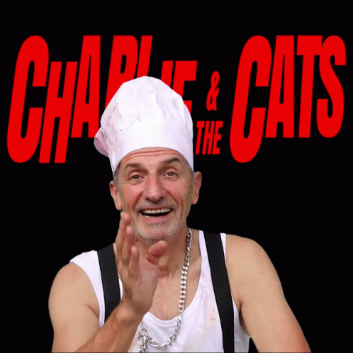 Man in Chef Hat with Charlie and the Cats
