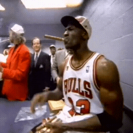 Man in Chicago Bulls Jersey Smoking Cigar