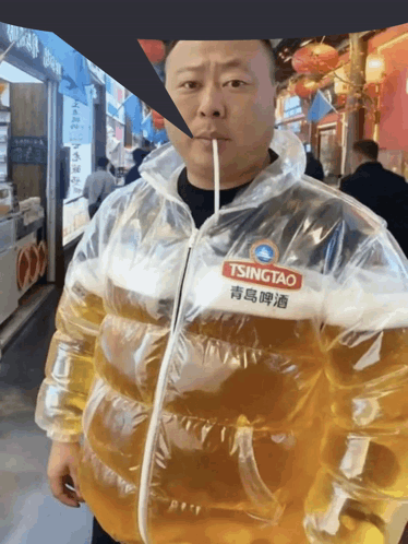 Man in Clear Jacket with Tsingtao