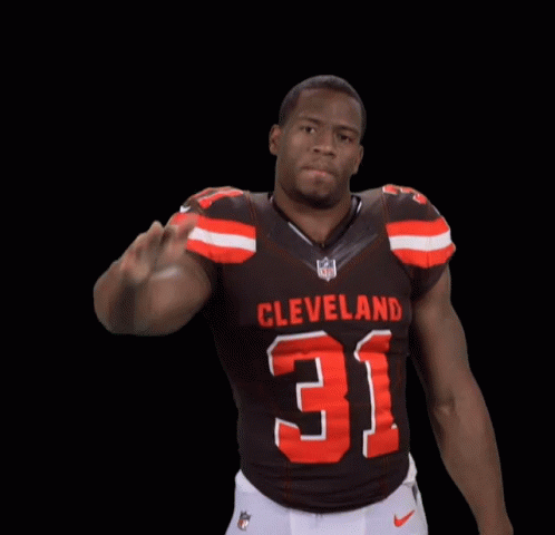 Man in Cleveland 31 Jersey Holding Up Hand