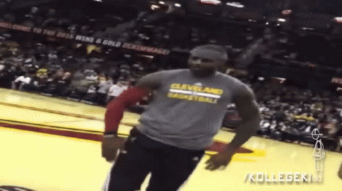 Man in Cleveland Basketball Shirt Dancing on Court