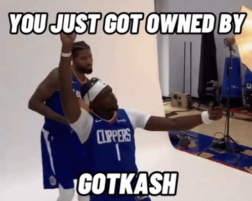 Man in Clippers Jersey Taking Selfie