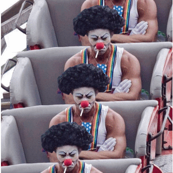 Man in Clown Wig Applying Makeup