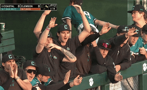 Man In Coast Baseball Uniform Holding Bat GIF